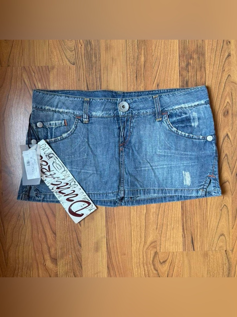 Low Rise Denim Mini Skirt with Distressed Details - Euro Brand